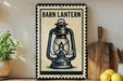 A vintage-style metal sign with the text "Barn Lantern" and an illustration of a lantern is displayed on a wooden shelf, accompanied by a potted plant, a cutting board, and some lemons.