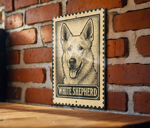 A wooden table with a framed image of a white shepherd dog on it, mounted on a brick wall.