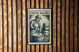 A black and white illustration of a man making cheese, with the text "CHEESE MAKING" prominently displayed.