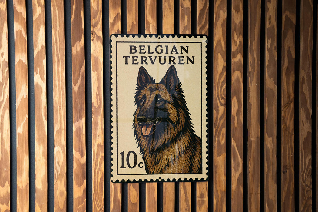 A postage stamp featuring a picture of a Belgian Terrier dog.