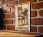 A sign featuring a drawing of a Shikoku dog, which is a breed of Japanese Shiba Inu dogs.