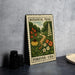A metal stamp with a botanical trail design, featuring a winding path surrounded by colorful flowers and plants, is displayed on a table.