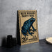A metal sign featuring a blue poison dart frog, with a price of 20 cents postage, is displayed on a table.
