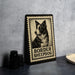 A black and white illustration of a Border Sheepdog on a wooden frame, with the text "BORDER SHEPP dog" below the dog's head.