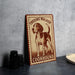 A metal sign with a picture of a beagle dog, labeled "TREEING WALKER COONHOUND", is displayed on a table.