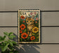 A colorful postage stamp featuring a cat surrounded by flowers, with the word "USA" printed on it.