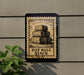 a sign with the text "HAY BALE STACK" and an illustration of hay bales stacked on top of each other.