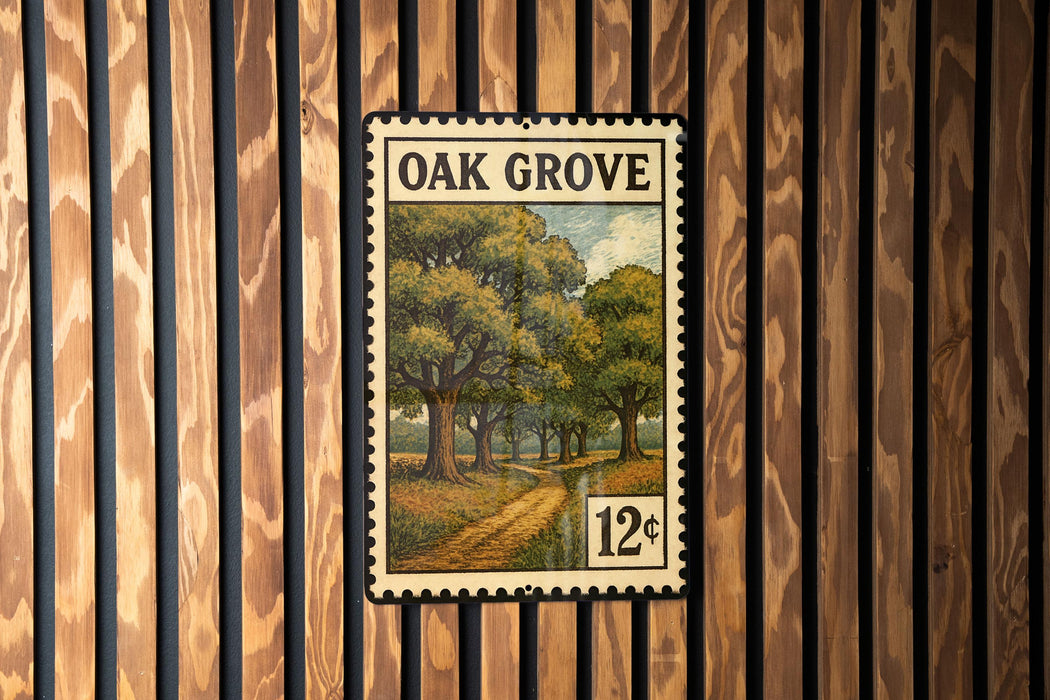 A vintage-style postage stamp featuring a scenic landscape with a path and trees, mounted on a wooden wall.