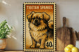 A framed illustration of a Tibetan Spaniel dog, with a price tag of 40 cents, is displayed on a wall next to a wooden cutting board and a potted plant.