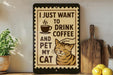 a sign with a cat and the text "I JUST WANT TO DRINK COFFEE AND PET MY CAT" displayed on a wall.