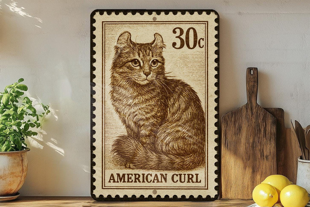 a framed stamp-like artwork depicting a cat, with the text "AMERICAN CURL" printed on it. The artwork is displayed on a shelf next to a wooden cutting board and a potted plant.