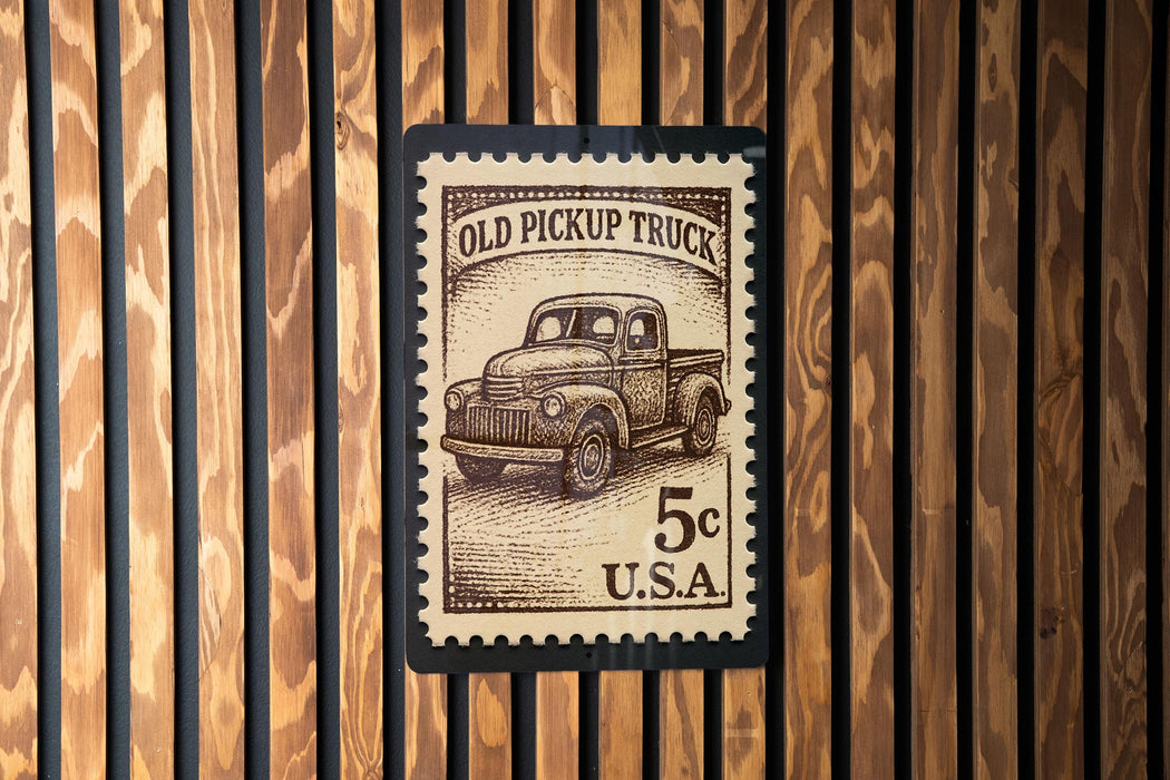 A 5c U.S. postage stamp featuring an illustration of an old pickup truck.