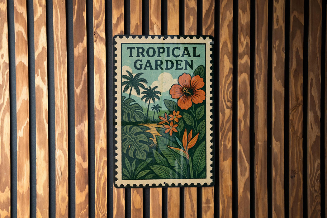 A vintage-style metal sign with a tropical garden theme, featuring palm trees, flowers, and lush foliage, is displayed on a wooden wall.