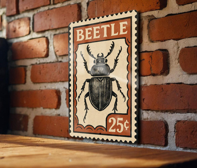 A vintage-style postage stamp featuring a detailed illustration of a beetle, with the word "BEETLE" prominently displayed.