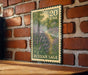 A 20 US dollar postage stamp featuring a Russian sage plant is displayed on a brick wall.