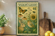 a wildlife garden-themed metal sign with illustrations of a rabbit, a bird, and flowers, placed on a wooden shelf next to a wooden cutting board and a potted plant.