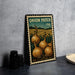 A metal stamp with an illustration of onions and a field, labeled "Onion Patch USA".