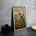 A metal sign with a floral design, featuring a variety of colorful flowers, is displayed on a table.