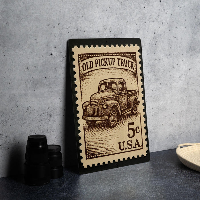 A framed stamp depicting an old pickup truck, with the text "OLD PICKUP TRUCK" and "5c U.S.A." printed on it.