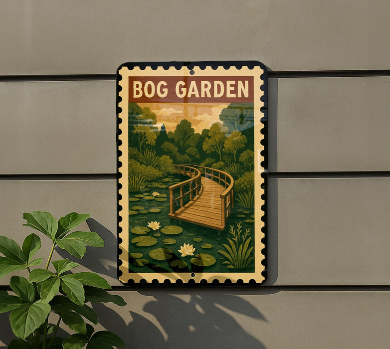 A sign for the Bog Garden, featuring a wooden bridge surrounded by lily pads and trees, is displayed on a wall.
