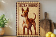 a vintage-style metal sign with an illustration of an Iberian hound, which is a type of hound breed. The sign is placed on a wooden surface, surrounded by various kitchen utensils and a potted plant.