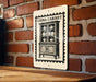 A sign with the word "CHINA CABINET" printed on it is displayed on a brick wall.