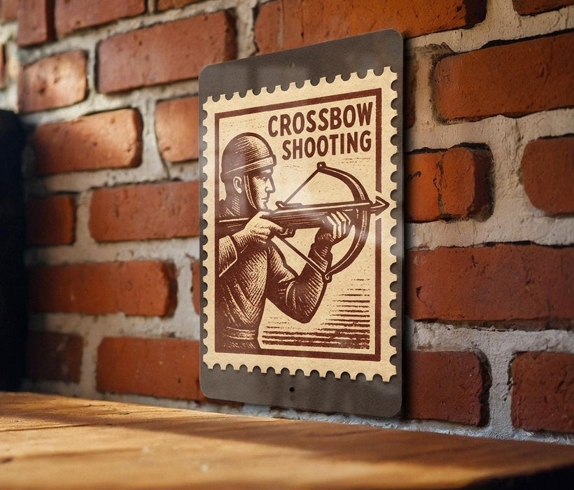 a sign with a crossbow and the text "CROSSBOW SHOOTING" on a brick wall.