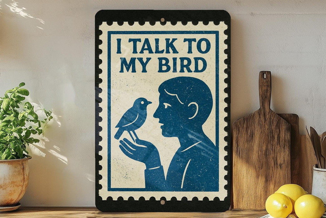 a framed poster with a blue bird and a man holding it, placed on a shelf next to a wooden cutting board and some lemons.