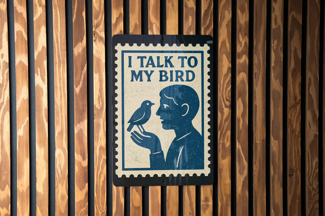 a sign with the text "I TALK TO MY BIRD" and an illustration of a person holding a bird.