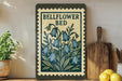 A framed illustration of bellflowers is displayed on a shelf, accompanied by a wooden cutting board and a potted plant.