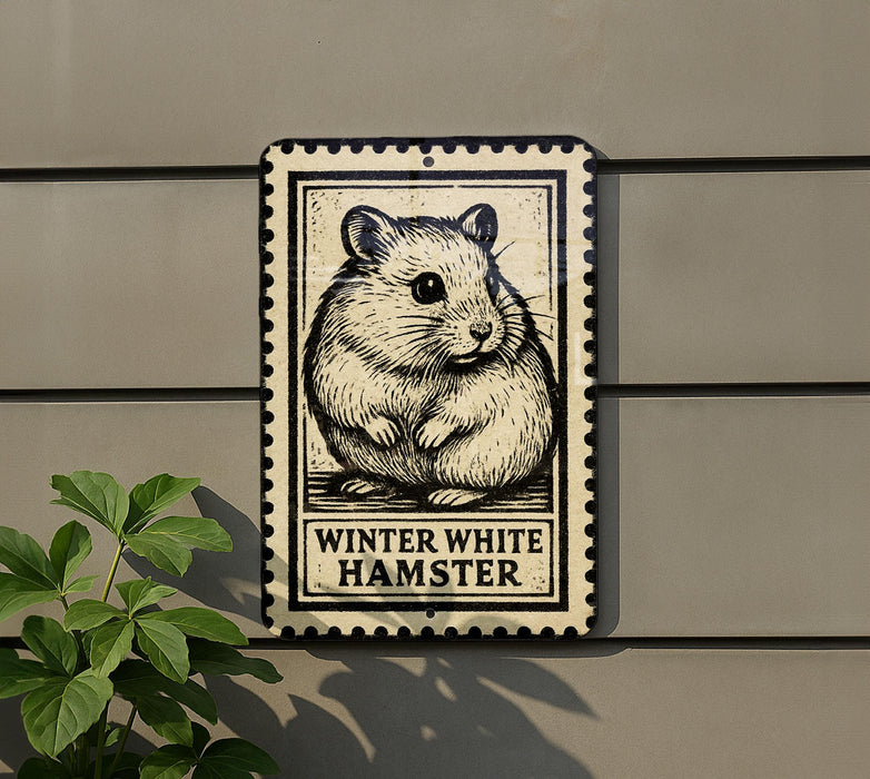 A metal sign featuring a hamster illustration is mounted on a wall, with a plant visible to the left.