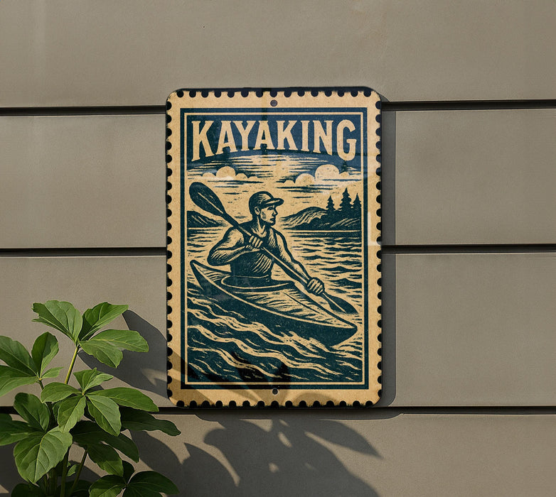 A sign featuring a man kayaking in a river, with the word "KAYAKING" prominently displayed.