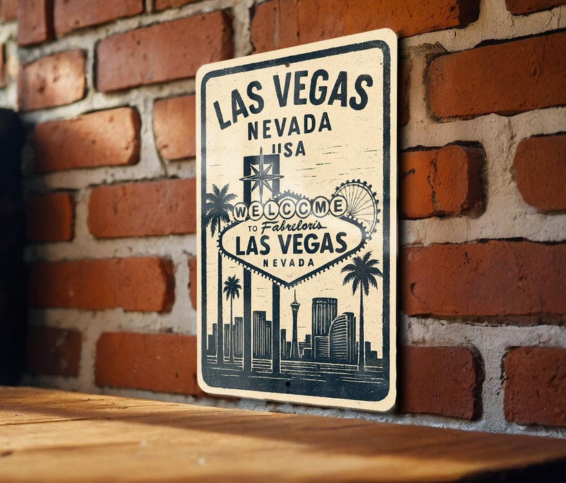A vintage-style sign for Las Vegas, Nevada, mounted on a brick wall.