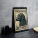 A black and white illustration of a curly-coated retriever dog is displayed on a black frame, with the text "CURLY-COATED RETRIEVER" printed on it.