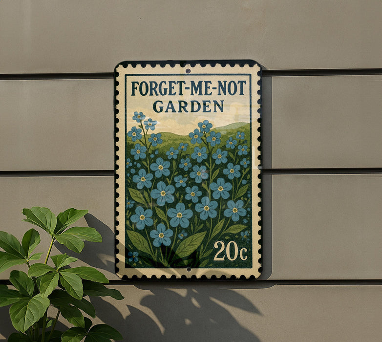 a sign with a floral design and the text "Forget-Me-Not Garden" on it, mounted on a wall.