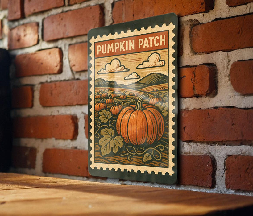 A vintage-style metal sign with a pumpkin patch illustration is mounted on a brick wall.
