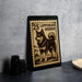 A 25 Lapponian Herder dog stamp is displayed on a black surface, with a stack of black camera lenses and a woven basket visible in the background.