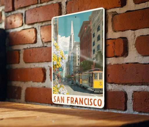 A framed photograph of a street scene in San Francisco, with a yellow trolley car visible in the background.