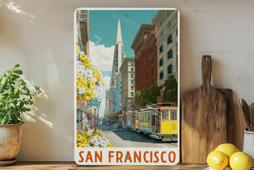 A framed poster of a street scene in San Francisco, featuring a trolley car and colorful buildings, is displayed on a shelf next to a wooden cutting board and some potted plants.