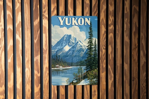 A vintage-style poster of a mountain landscape with a lake and pine trees, featuring the word "Yukon" prominently displayed.