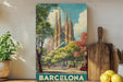 A framed poster of the Sagrada Familia, a famous Roman Catholic church in Barcelona, Spain, is displayed on a wall.