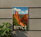 A vintage-style sign depicting the scenic landscape of Bryce Canyon National Park, with the word "BRYCE" prominently displayed.