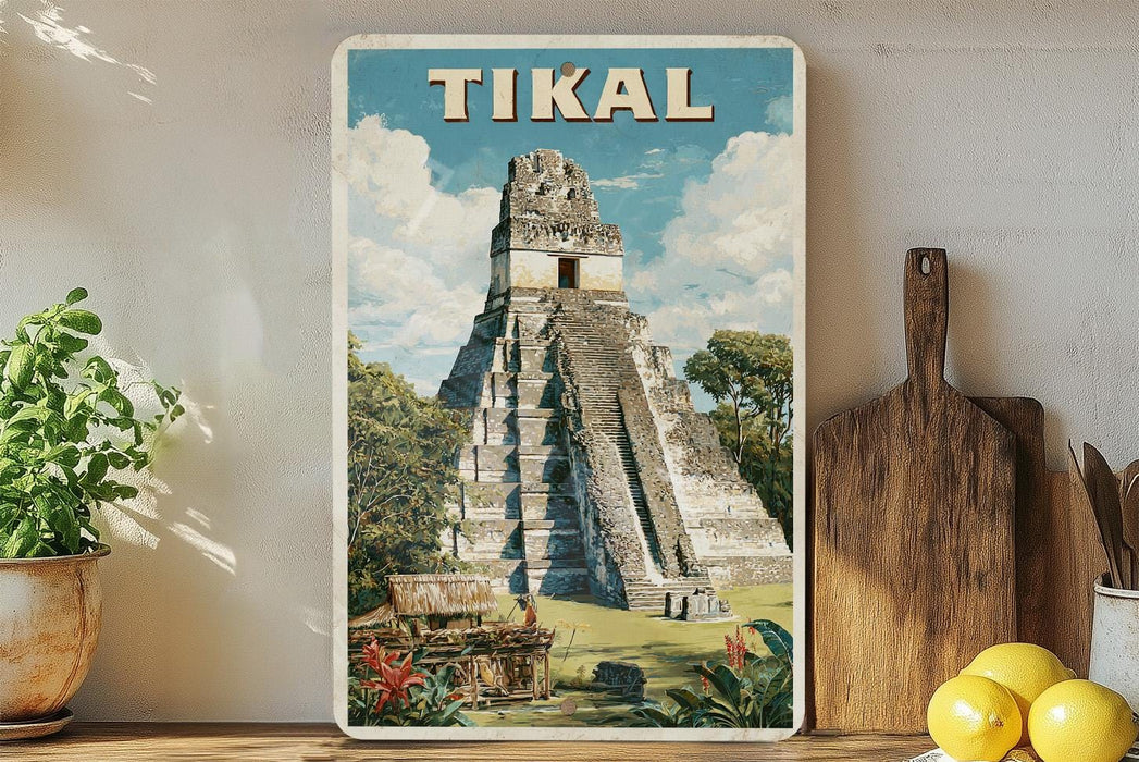 A vintage-style poster of the Mayan pyramid of Tikal, a famous landmark in Guatemala, displayed on a wall.