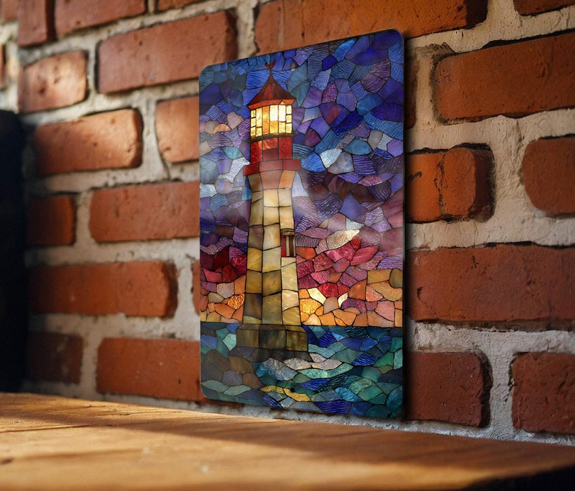 A colorful mosaic artwork depicting a lighthouse is displayed on a brick wall.
