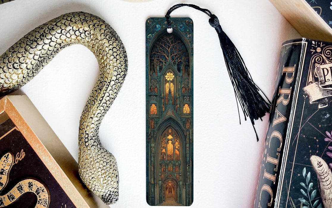 a decorative snake-shaped bookmark with an ornate design, placed next to a book titled "Practice" and a black tassel.