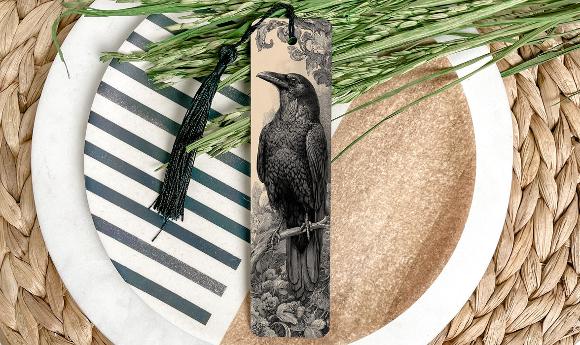 a black and white illustration of a bird perched on a branch, surrounded by a wicker basket and a striped plate.