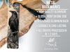 a metal bookmark with a black and white illustration of a bird perched on a branch.