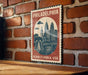 A vintage-style metal sign with the text "PHILADELPHIA PENNSYLVANIA USA" and an illustration of Philadelphia's skyline, including the Liberty Bell, is displayed on a brick wall.