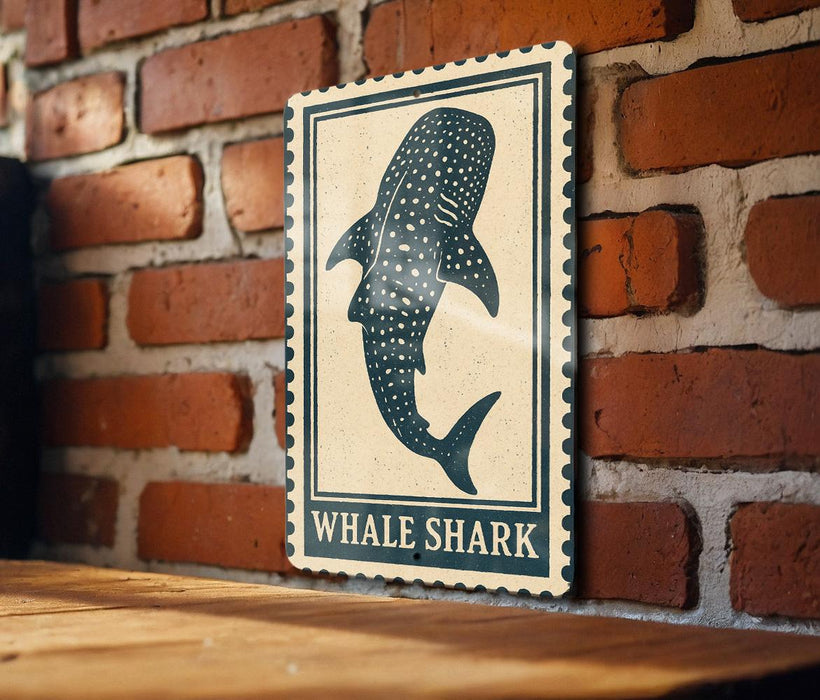 a wooden table with a framed sign depicting a whale shark.
