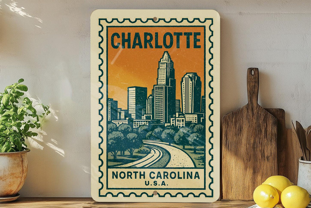 A vintage-style postage stamp depicting the Charlotte, North Carolina skyline, with a wooden cutting board and lemons in the foreground.